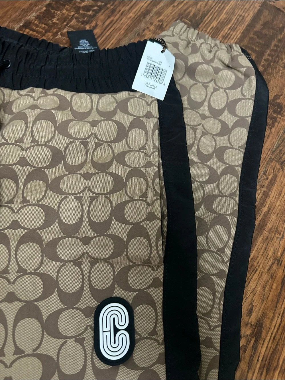 Coach Tan Monogram Sweatpants with Black Side Panel